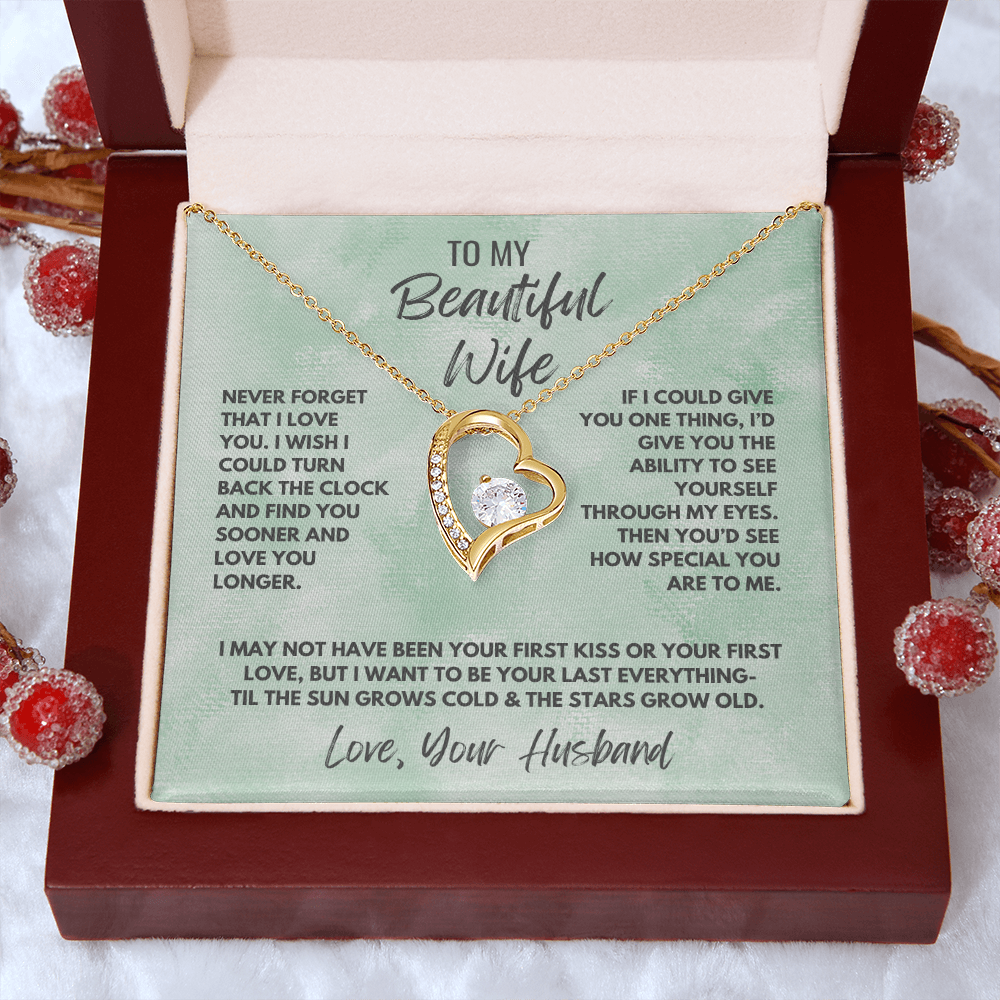 Forever Love Necklace, available in white or yellow gold.