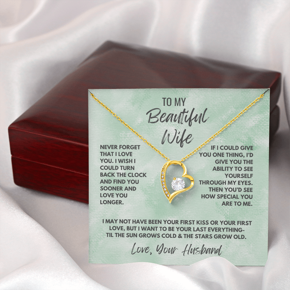 Forever Love Necklace, available in white or yellow gold.
