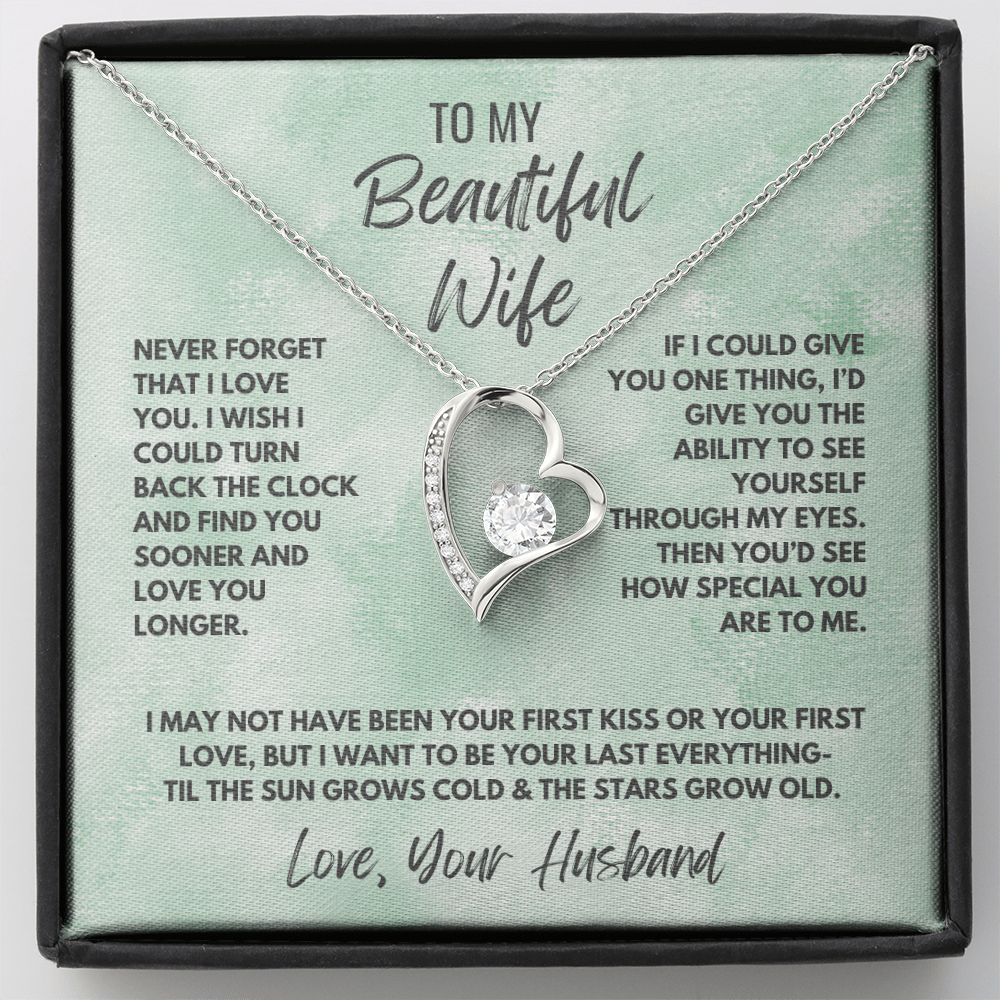 Forever Love Necklace, available in white or yellow gold.