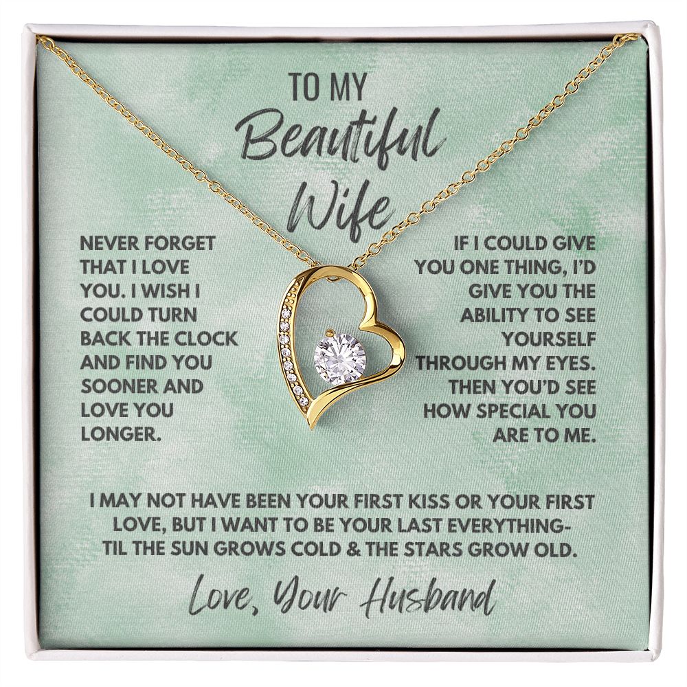 Forever Love Necklace, available in white or yellow gold.