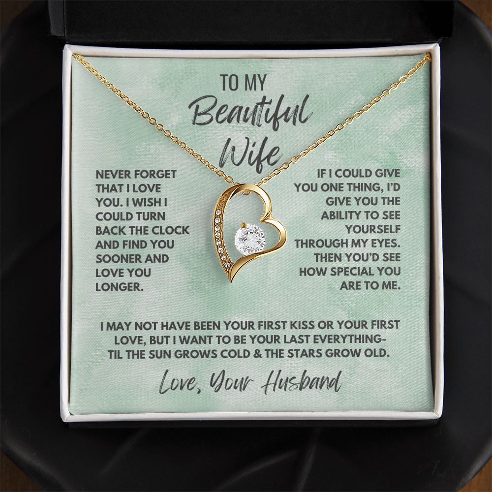 Forever Love Necklace, available in white or yellow gold.