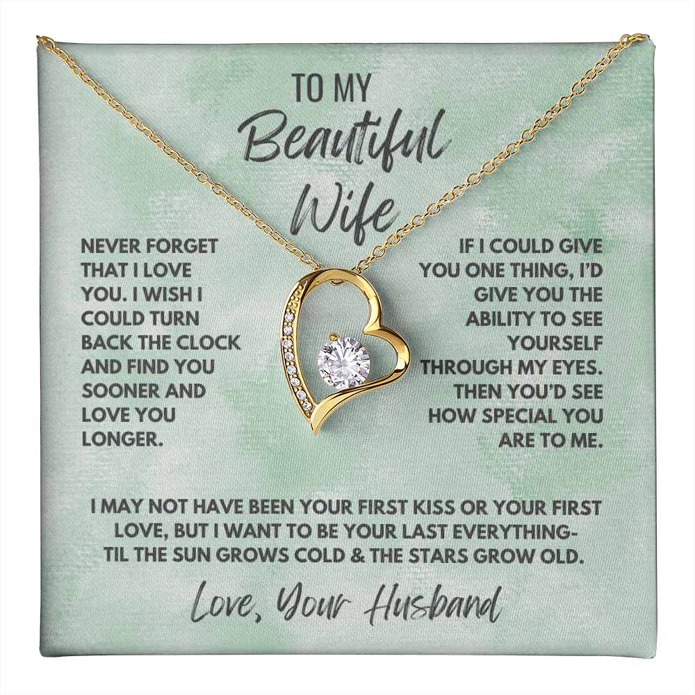 Forever Love Necklace, available in white or yellow gold.