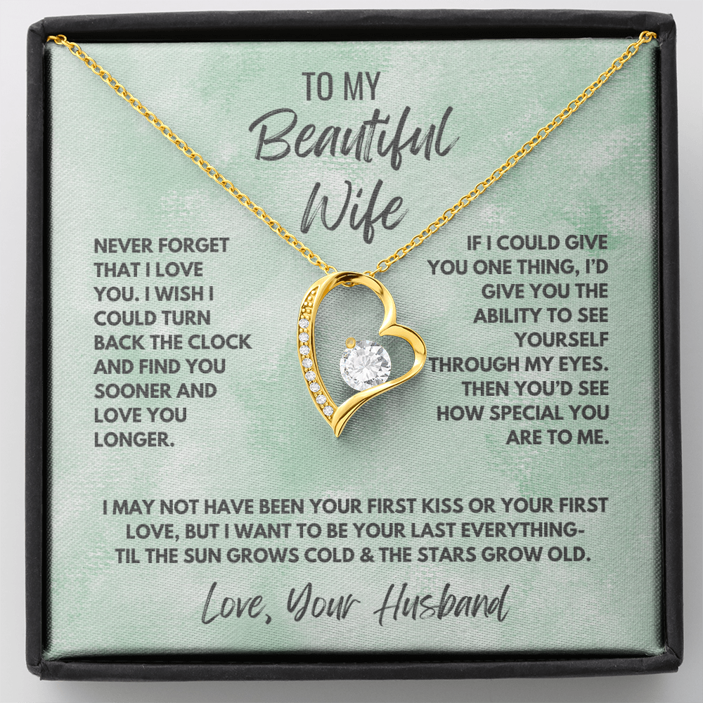 Forever Love Necklace, available in white or yellow gold.