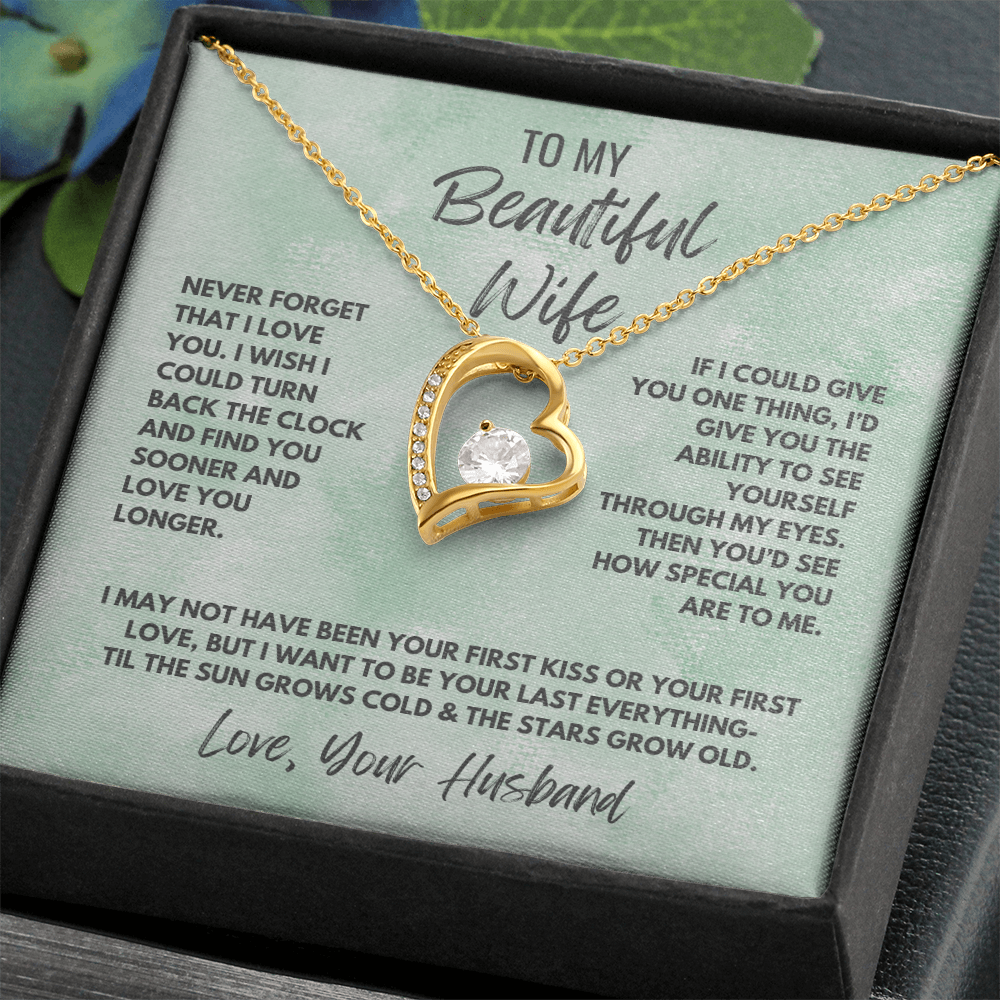 Forever Love Necklace, available in white or yellow gold.
