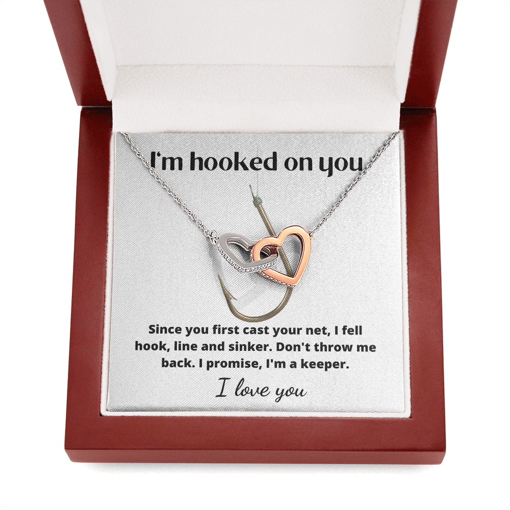 Beautiful interlinking hearts necklace for the one you are 'hooked on'!